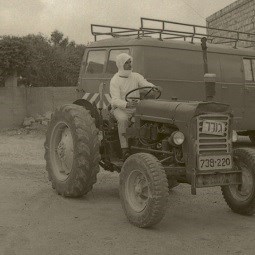 Druze Farmer Riding a Tractor