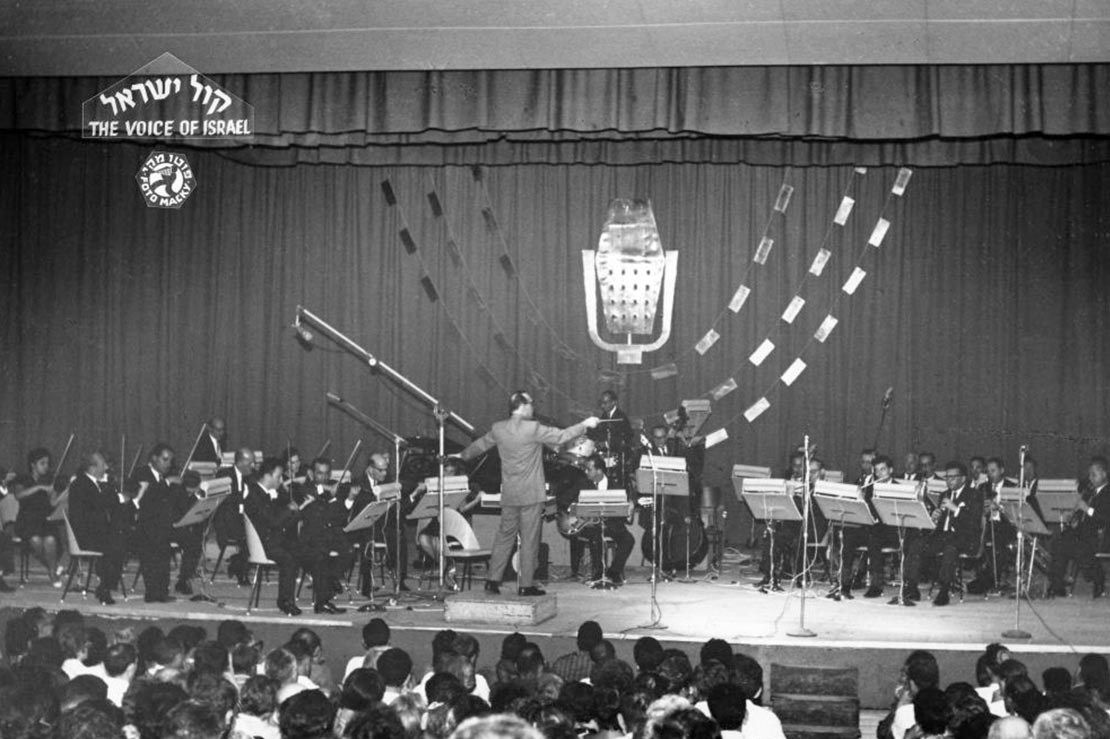 Moshe Wilensky conducting "The Voice of Israel Orchestra" in the Y.M.C.A. in Jerusalem (The Moshe Wilensky Archive, MUS 0069)